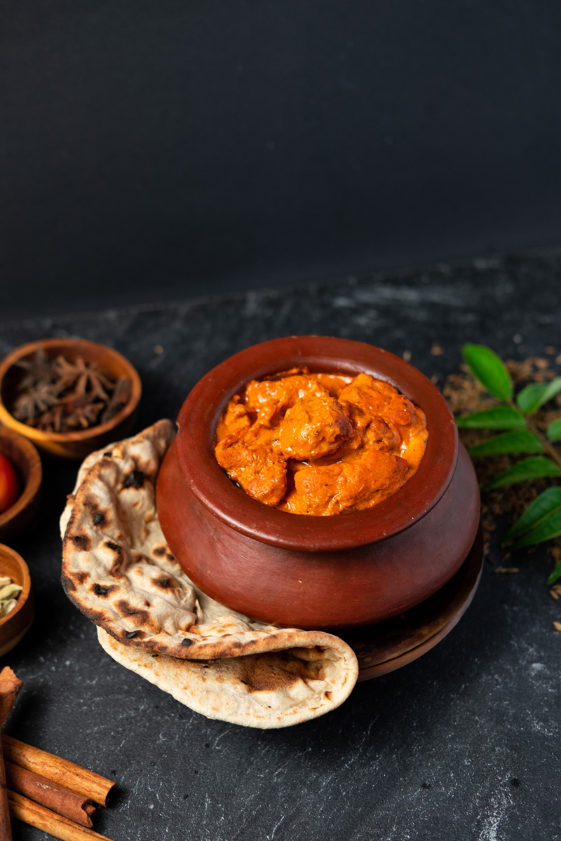 Murgh Makhani in a clay pot with chapati at Queen’s of India Kuta Bali